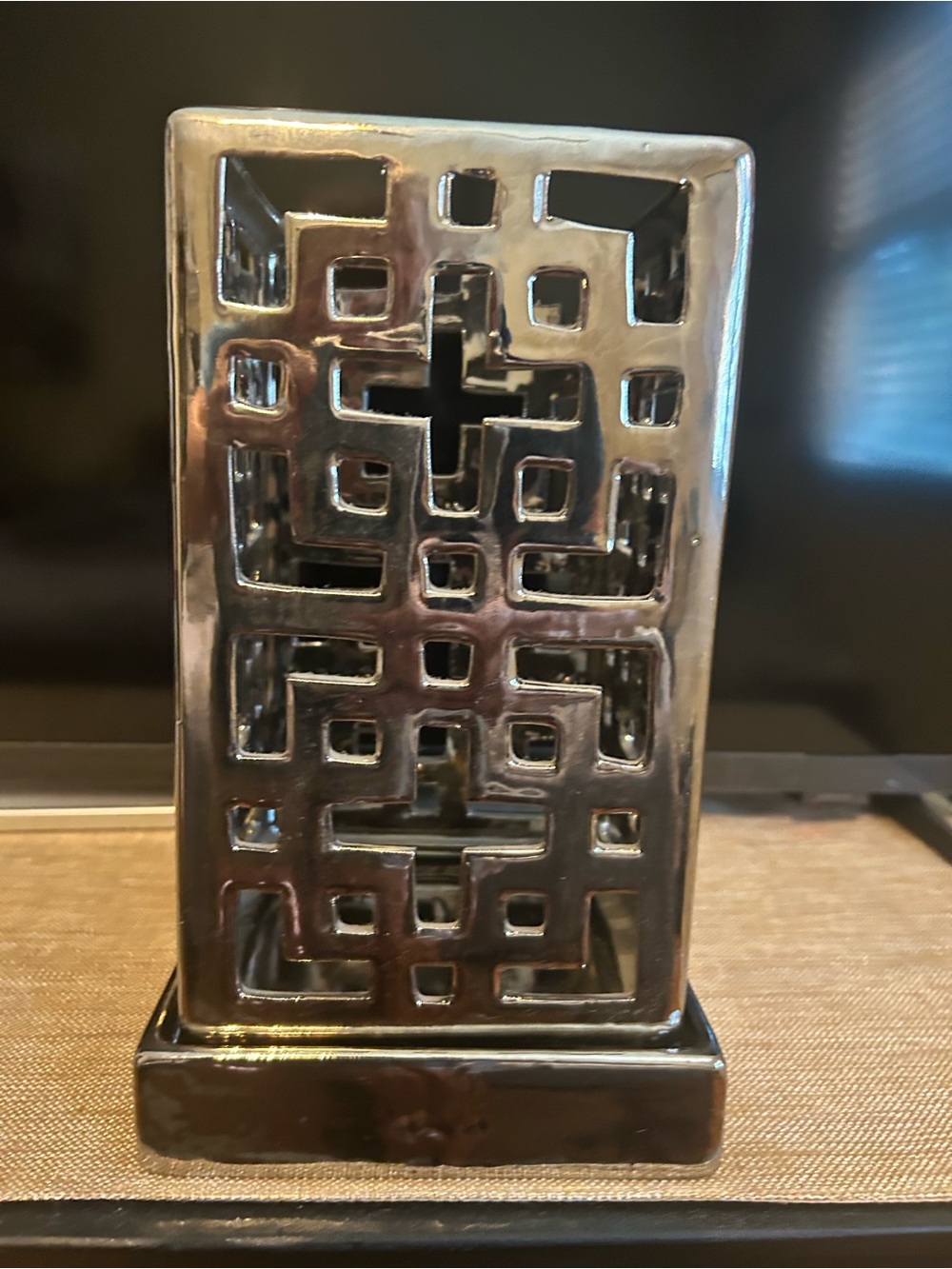 Silver tone pillar candle holder with Geometric Cutouts